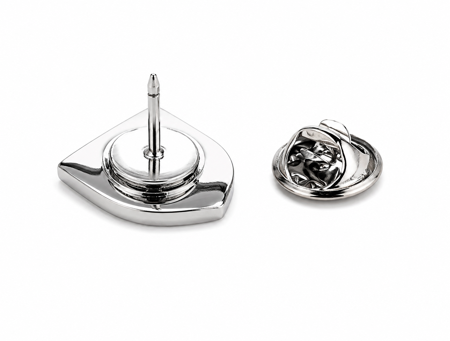 A polished silver-tone metal pin shown from two angles on a white background: one view displays the flat square backing with a central post, and the other shows the reverse side with a looped clasp mechanism.