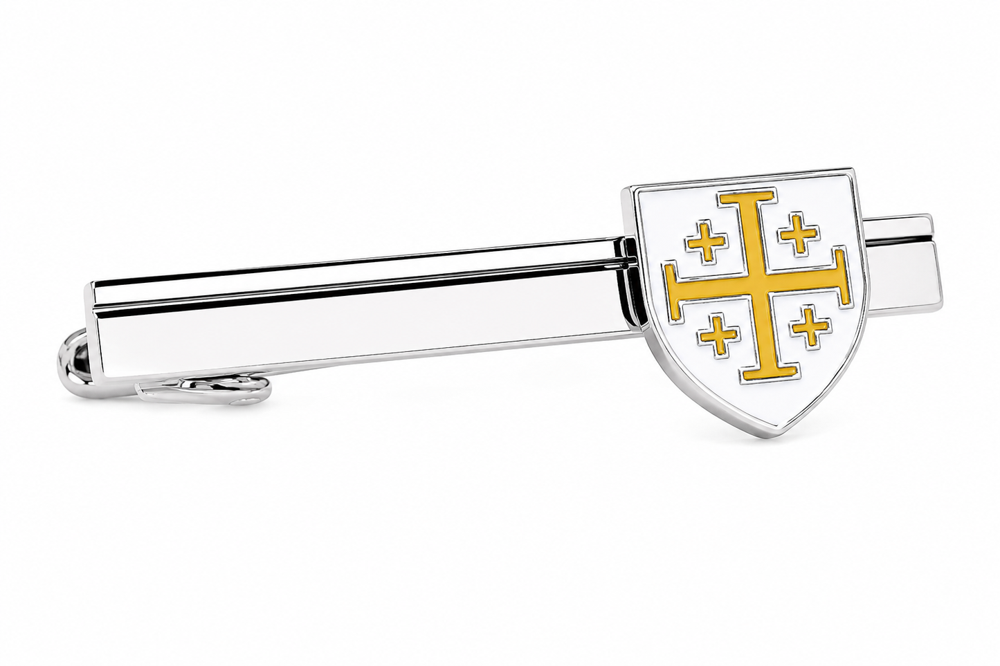A silver-toned tie clip featuring a shield emblem with a gold cross and five smaller crosses on a white background.
