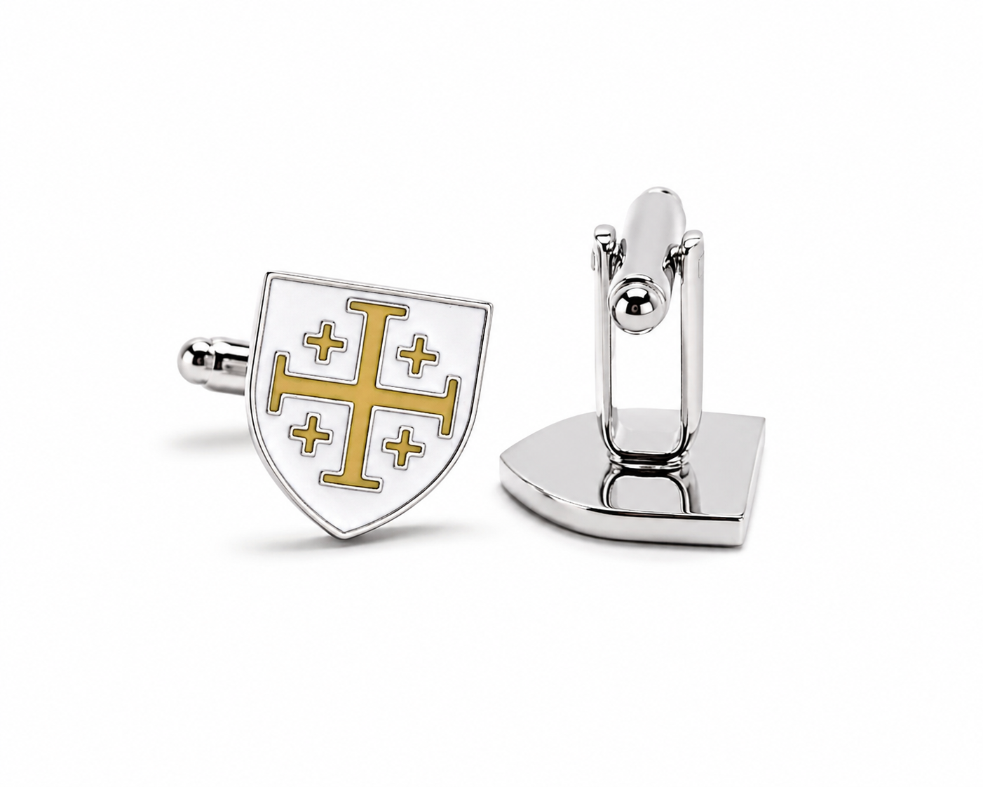 A pair of silver-toned cufflinks on a white background, one showing the front with a white shield emblem featuring a gold cross and four smaller crosses, and the other showing the back with a polished silver clasp.