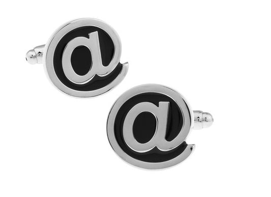 Cufflinks with '@' symbol design on a white background
