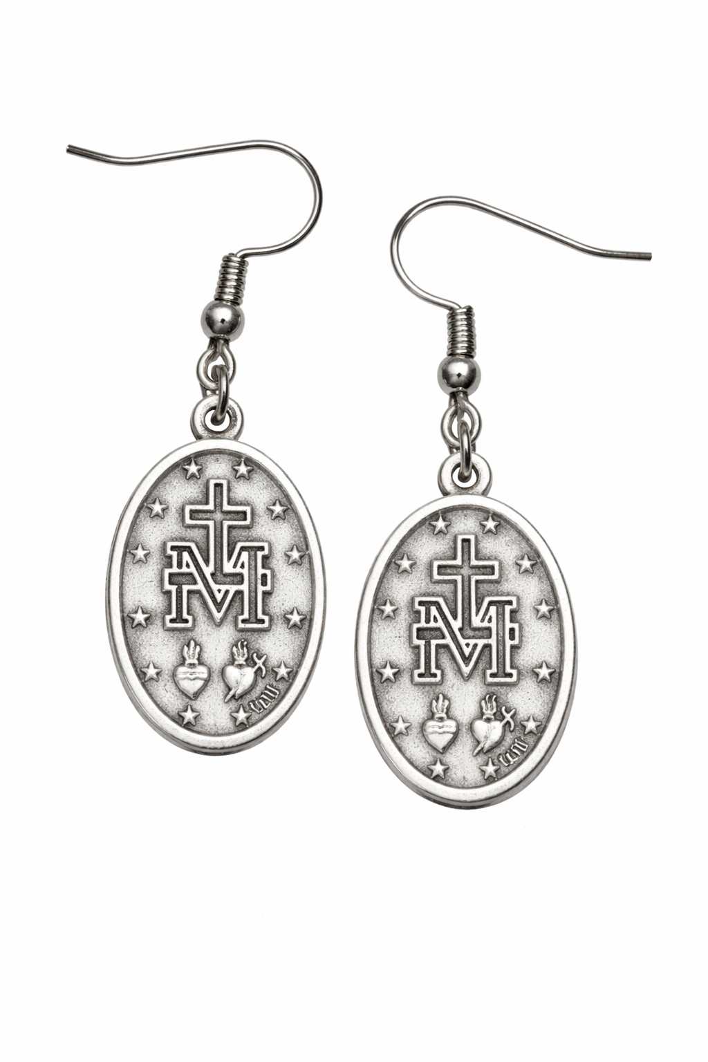 Pair of silver earrings with religious design on a white background