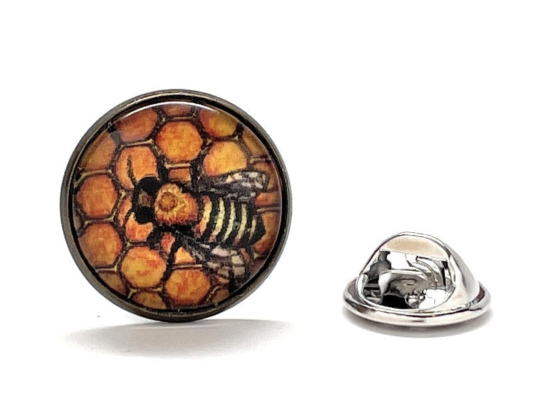 Honeycomb bee lapel pin with amber honeycomb design and glossy dome finish, shown with silver clutch backing