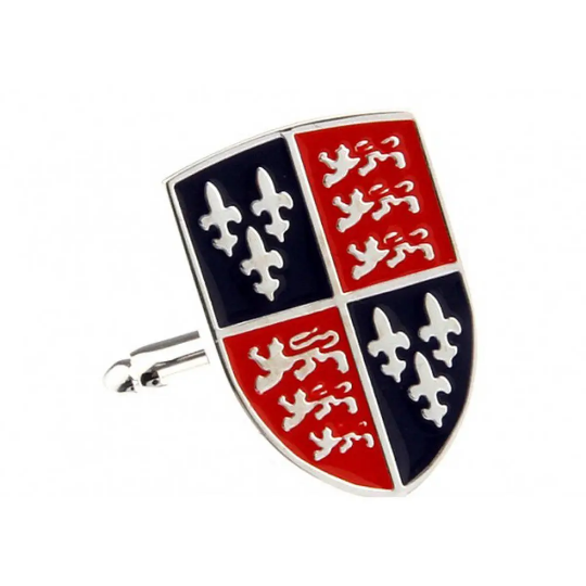 Shield-shaped cufflink with red, blue, and white design on a white background