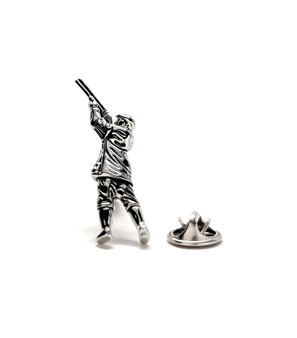 A silver-plated enamel lapel pin featuring a 3D game bird hunting design, accompanied by a butterfly clasp.