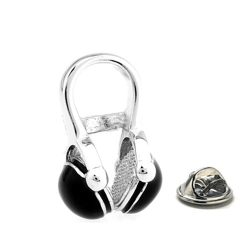 Silver and black heart-shaped earring on a white background