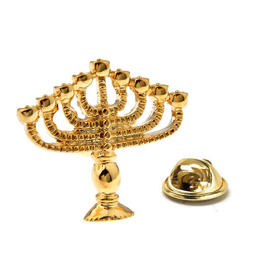 Gold menorah lapel pin on a white background