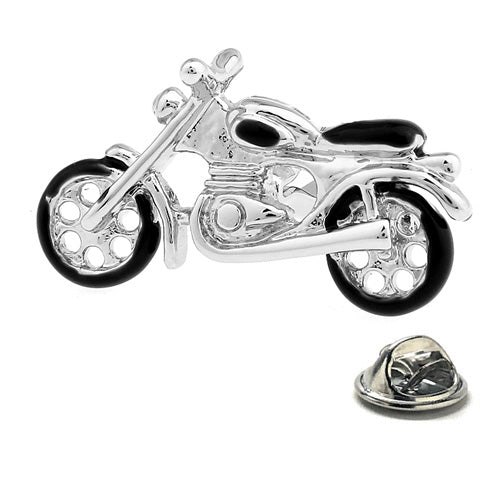 Motorcycle-shaped lapel pin on a white background