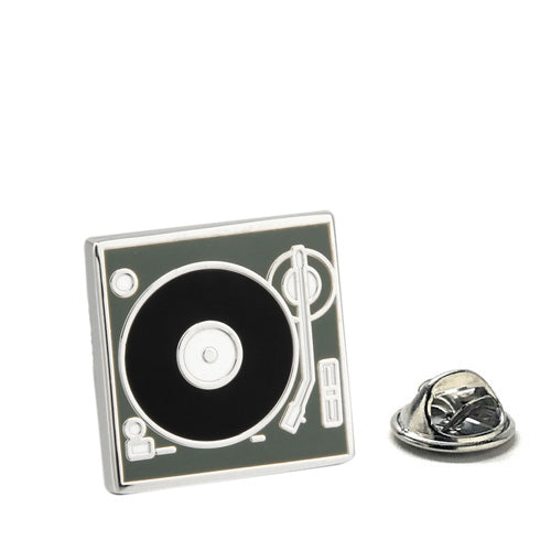 Turntable lapel pin on a white background