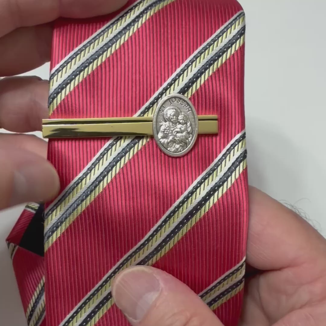 Saint Joseph Guardian Tie Clip handcrafted with a polished gold tie bar and detailed silver Saint Joseph medal for Catholic men and formal wear.