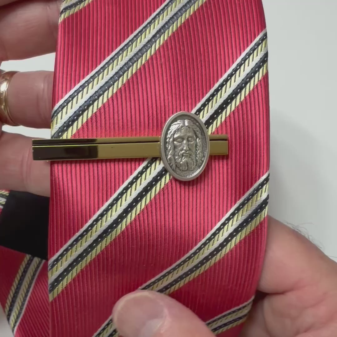 Holy Face Heritage gold Christian tie clip with antique silver Holy Face medallion for men's formal wear.
