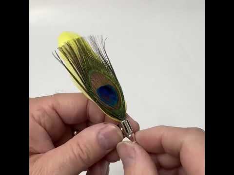 Yellow accent feather lapel pin with silver pin mount and butterfly clasp.