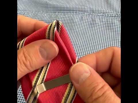 Silver Scales of Justice tie bar on red and gold striped tie — elegant lawyer or judge gift, handcrafted by JayPins.