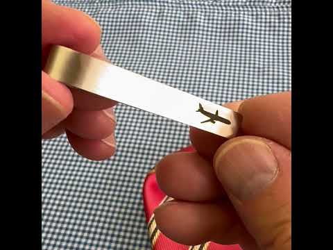 Silver airplane tie bar shown close-up — handcrafted aviation-themed accessory, perfect gift for pilots and aviation lovers by JayPins.