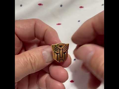 Gold Transformers Logo Lapel Pin – Robot Emblem Pin for Fans, Collectors & Cosplay | Gold Autobot-Style Badge
