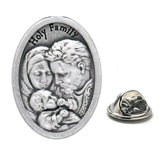Silver 'Holy Family' medallion on a white background