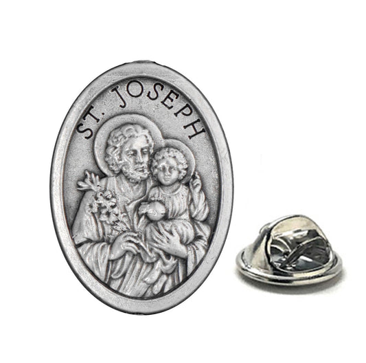 Silver Saint Joseph medallion on a white background