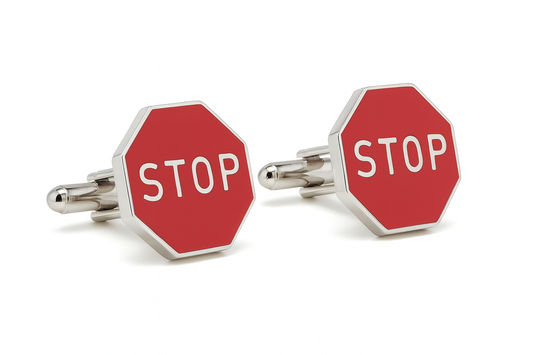Red stop sign cufflinks with white 'STOP' text on a white background
