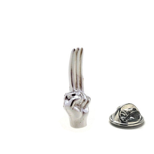 Silver Wolverine claw lapel pin with butterfly clutch backing on white background