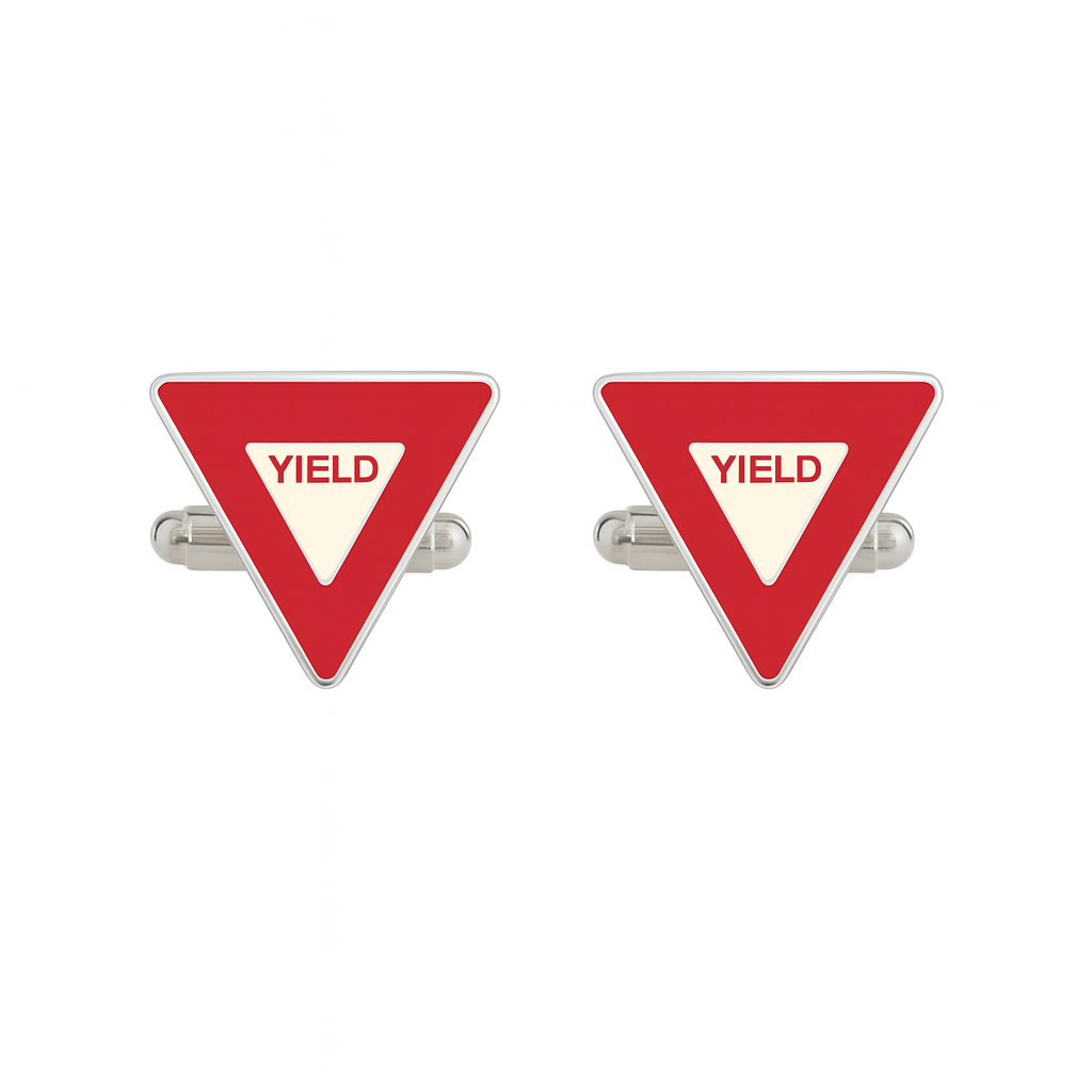 Red triangular yield sign cufflinks on a white background
